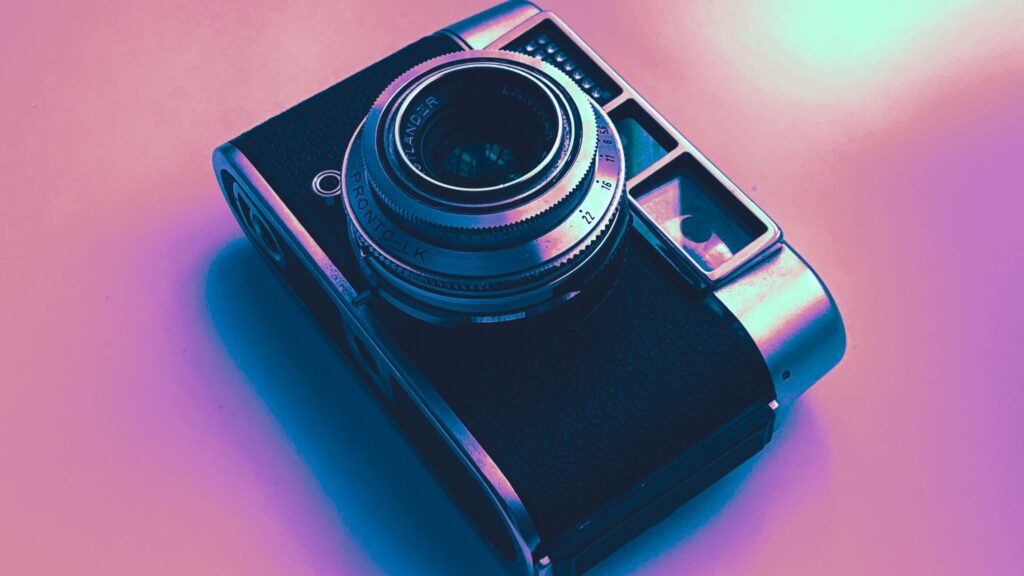 Digital camera representing  growing demand for screen-free tech.